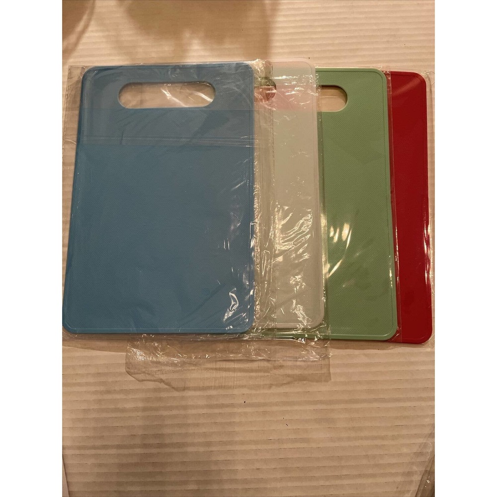 Set Of Four Thin Plastic Cutting Boards 71/2 inches by 11 1/2 inches